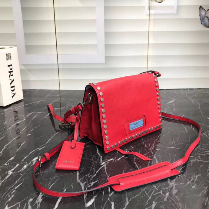 Prada Etiquette Bag In Red Calfskin With Metal Stud Trim