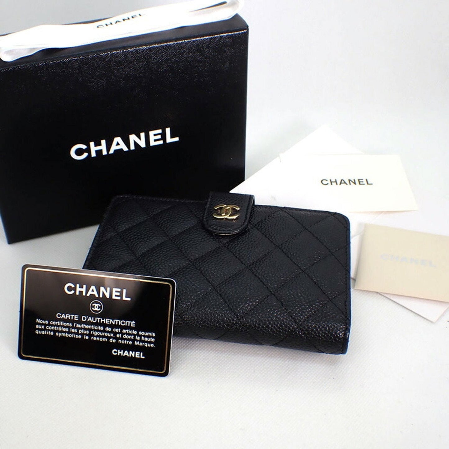 CHANEL caviar skin matelasse black two-fold wallet