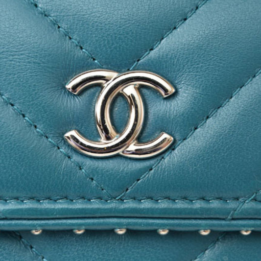 CHANEL wallet  chevron studs turquoise blue