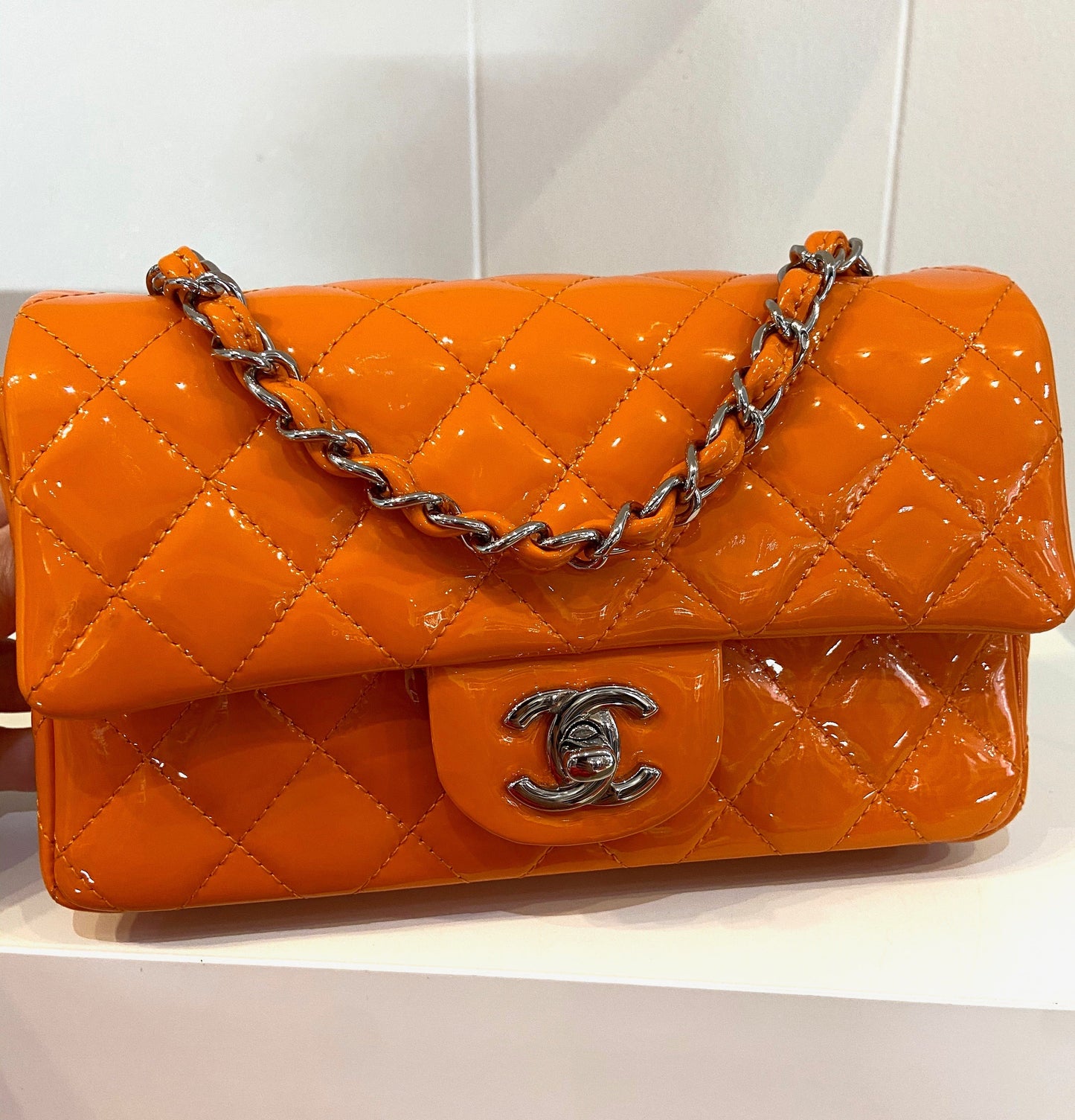 CHANEL QUILTED PATENT LEATHER MINI FLAP BAG