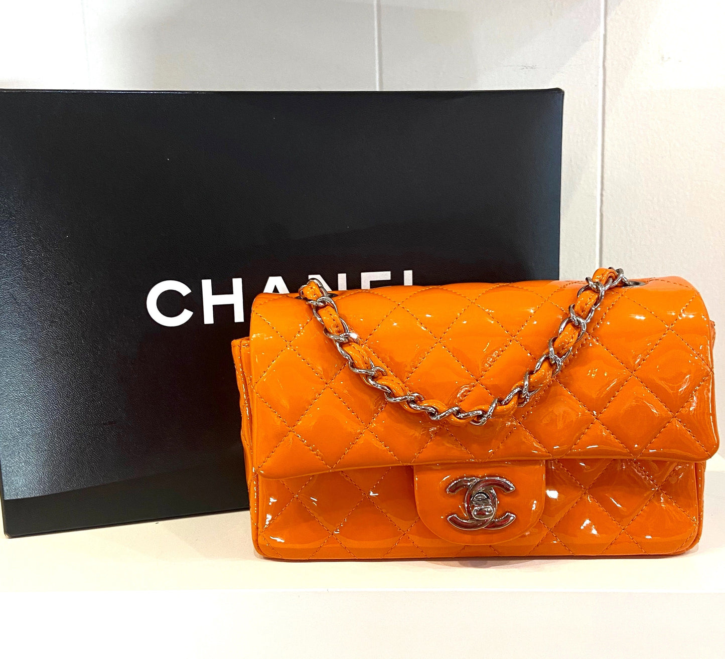 CHANEL QUILTED PATENT LEATHER MINI FLAP BAG