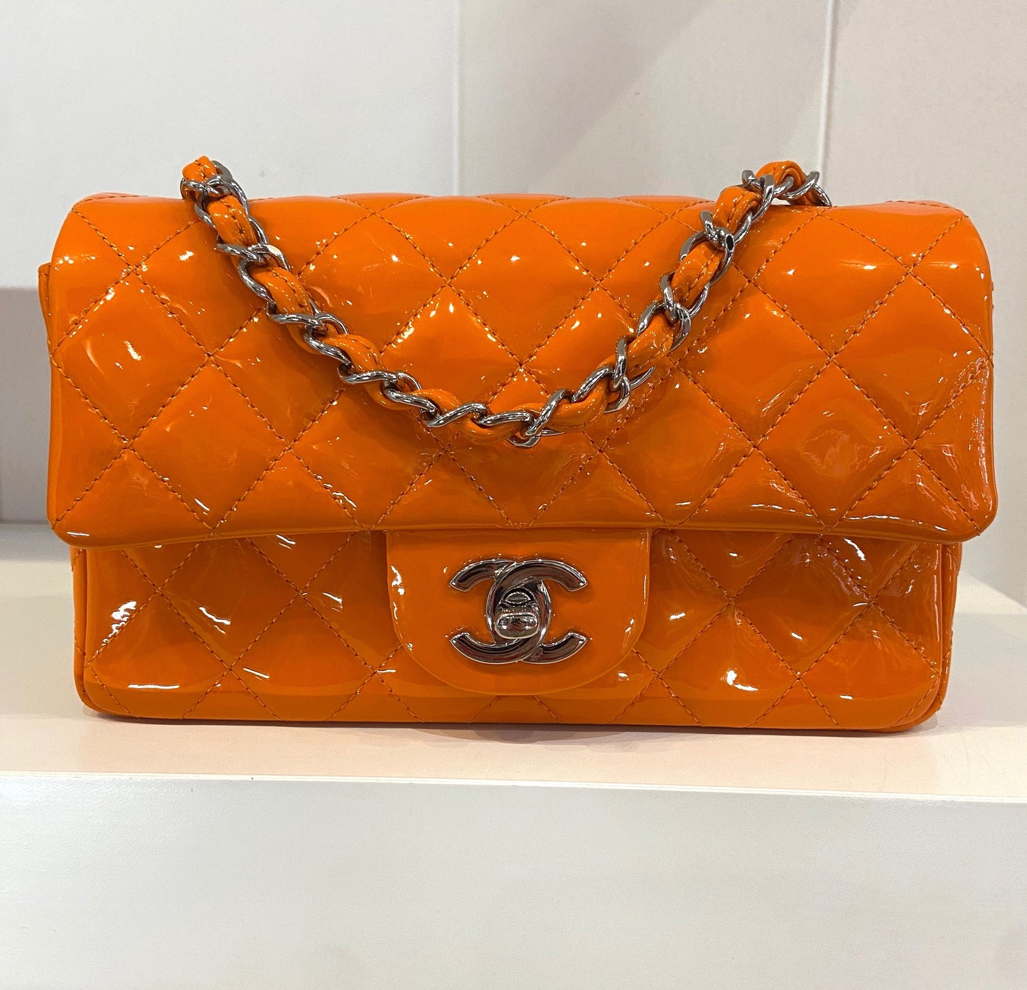 CHANEL QUILTED PATENT LEATHER MINI FLAP BAG