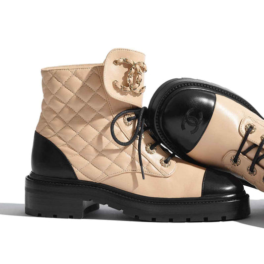 CHANEL QUILTED CC CHAIN COMBAT BOOTS