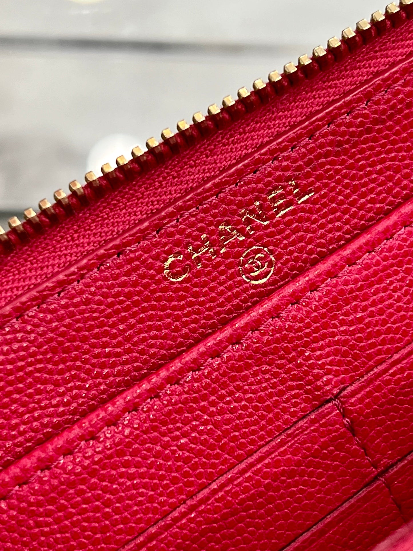 CHANEL CC CAMELLIA EMBOSSED LEATHER ZIPPY WALLET