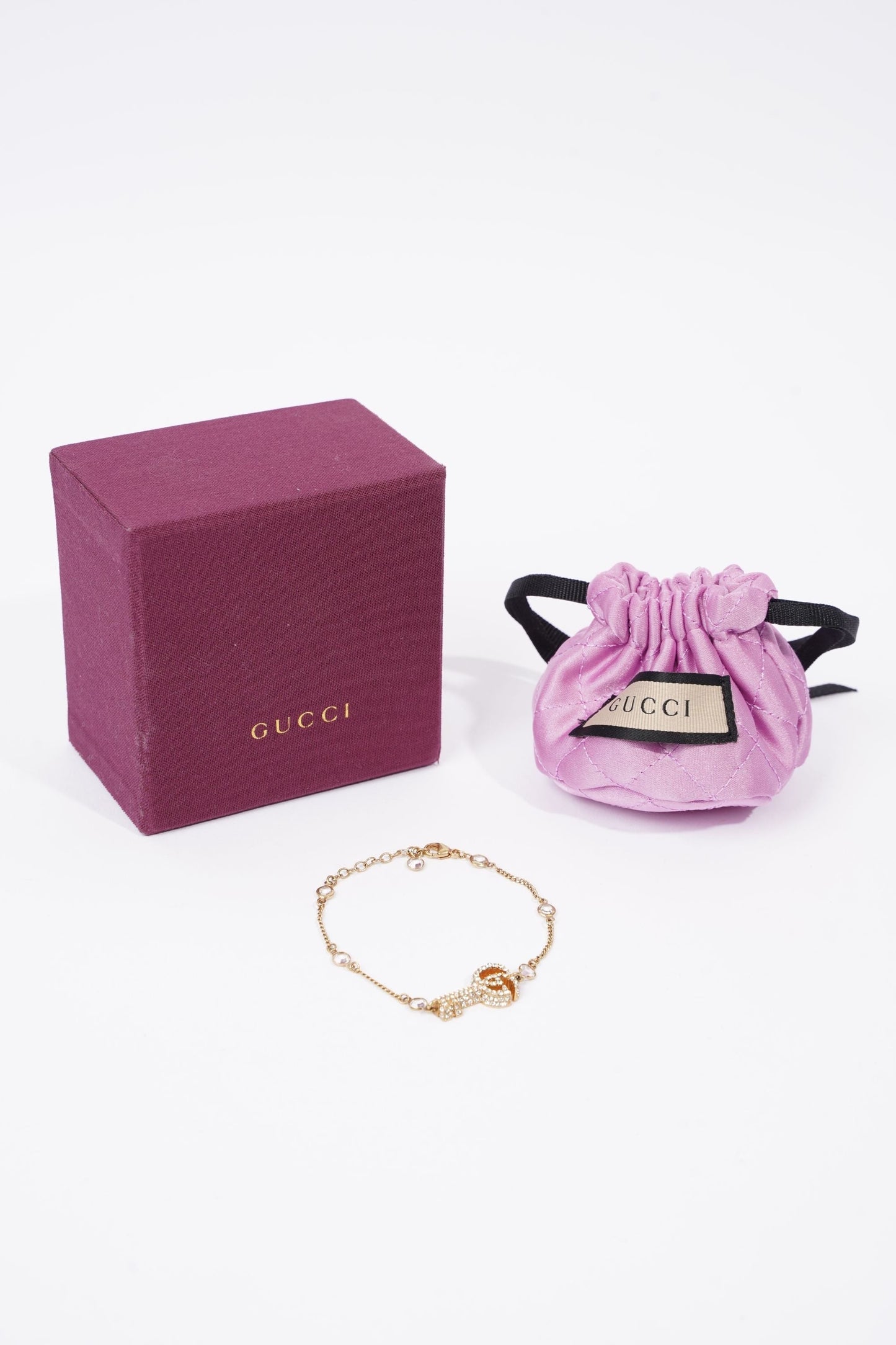 Gucci Womens Crystal-Embellished Double G Key Bracelet Gold / Silver