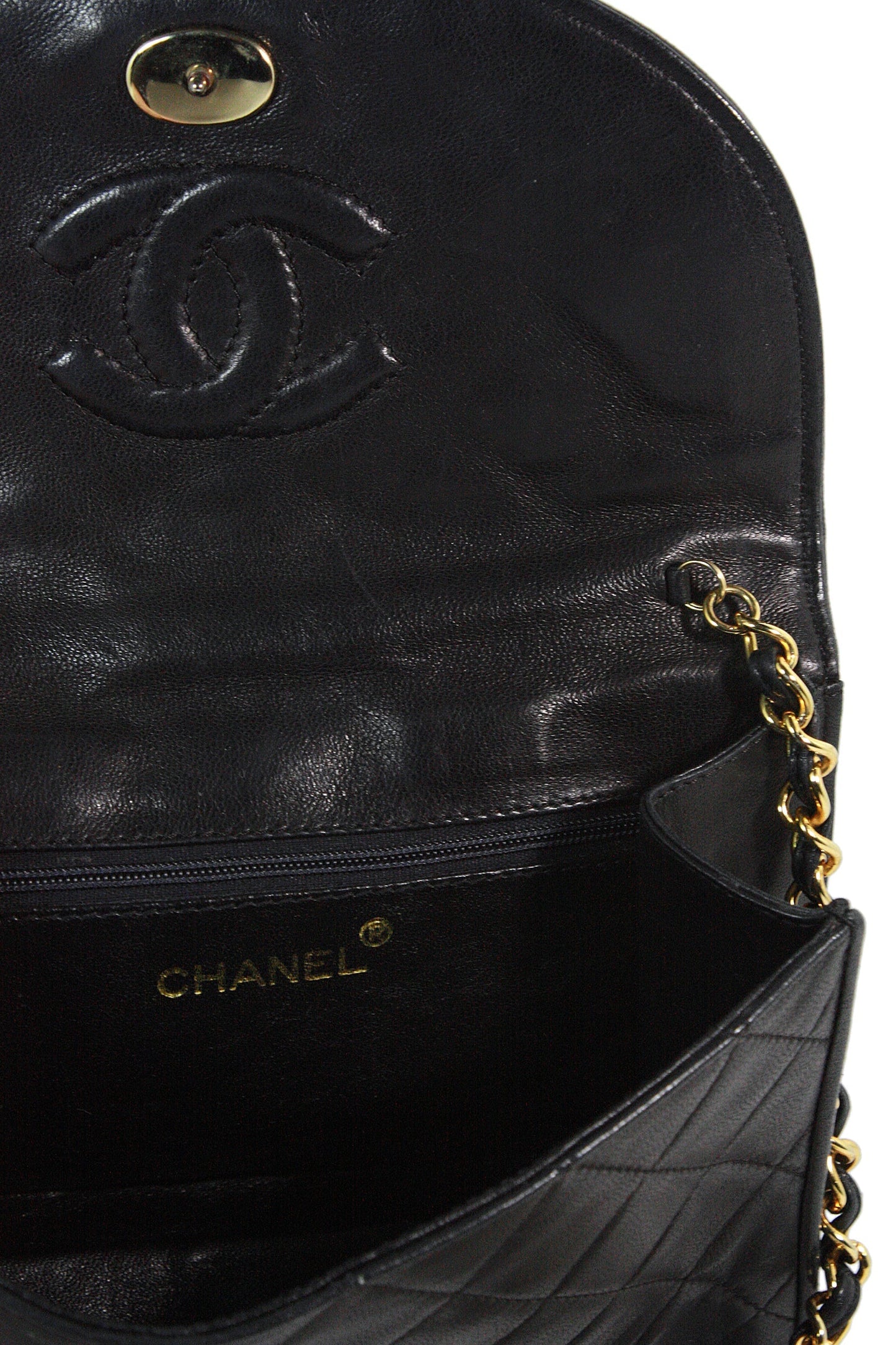 CHANEL 1990s Quilted Black Leather Crossbody Bag with Tassel