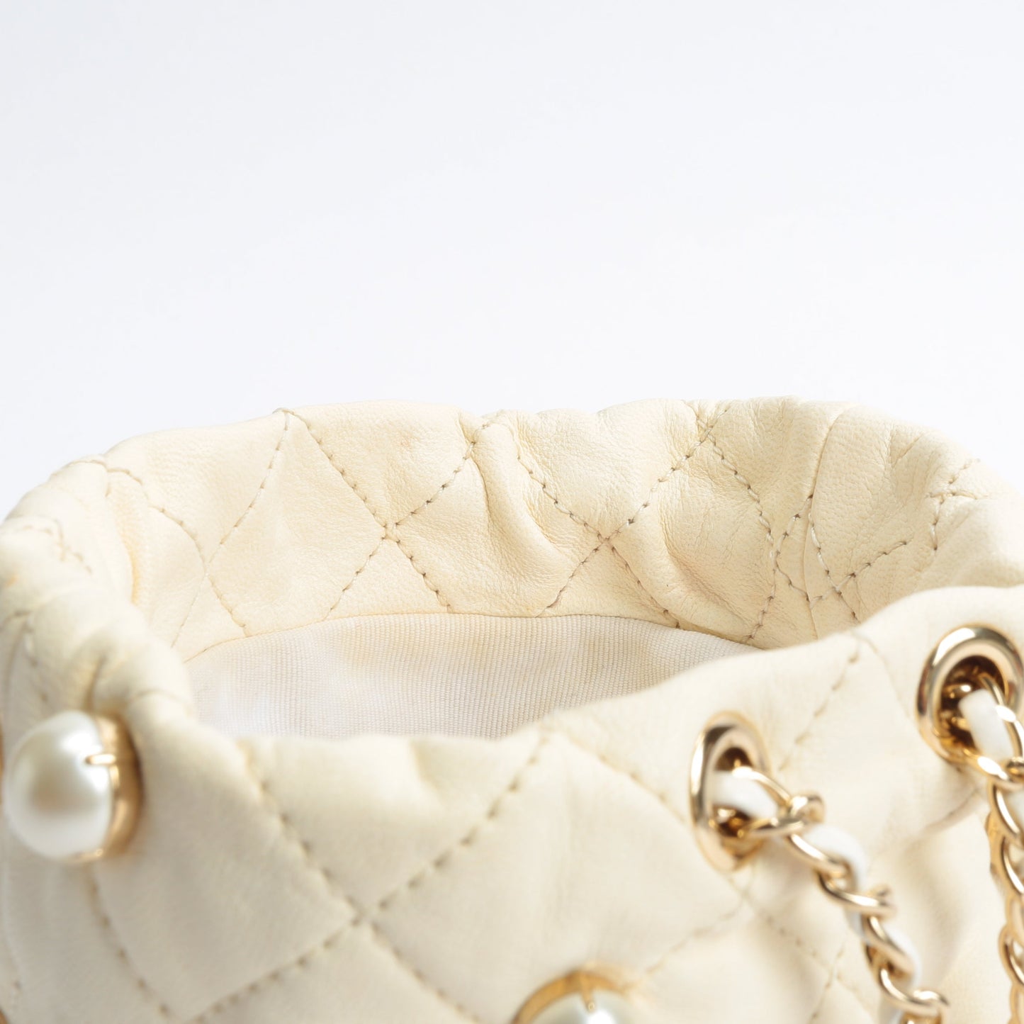 CHANEL Quilted Mini About Pearls Drawstring - OUTLET FINAL SALE