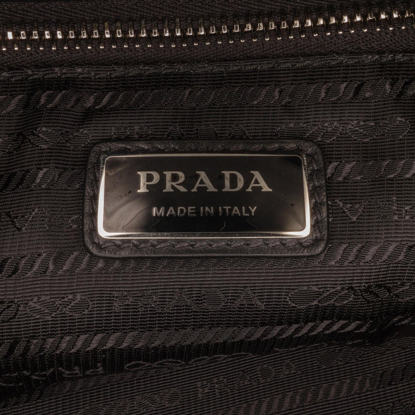 Prada Embossed Logo Satchel (SHG-sEtexd)