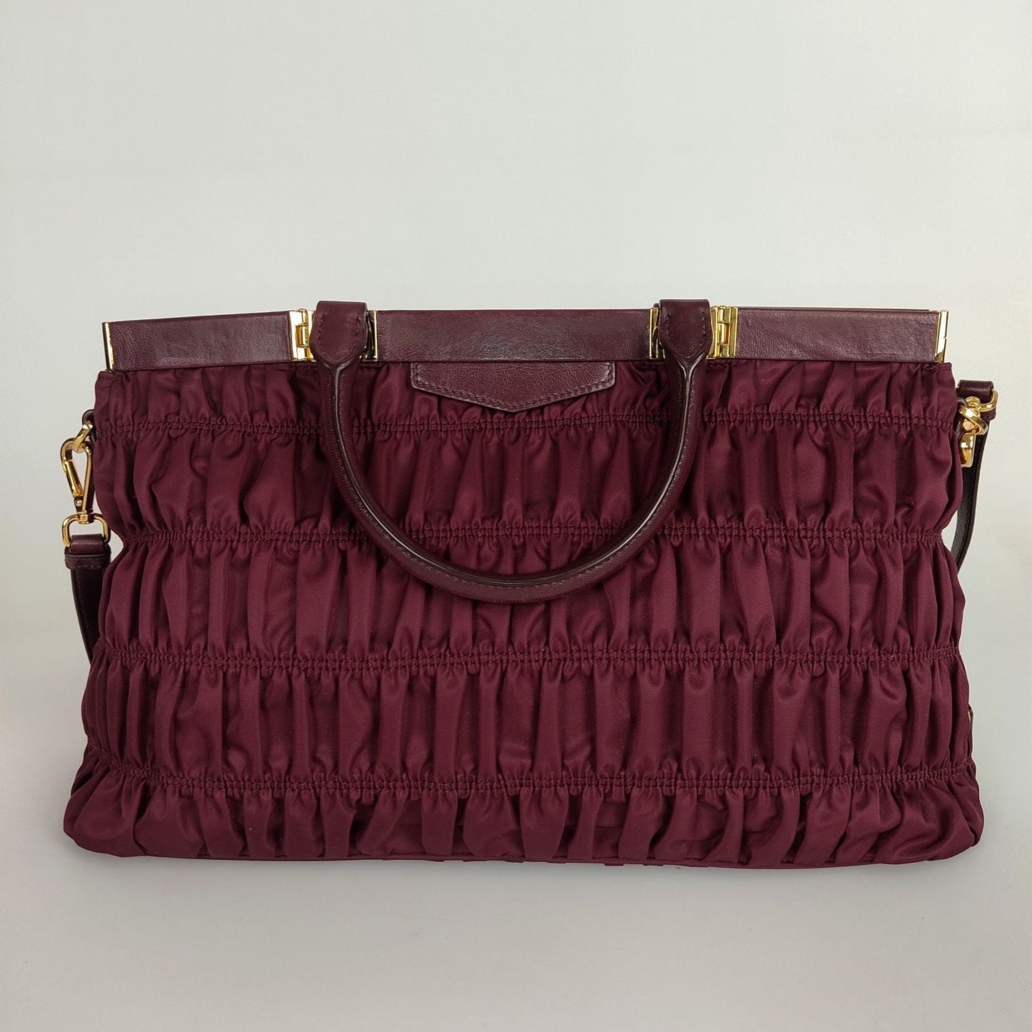 PRADA Gaufre shoulder bag in burgundy nylon and leather trim