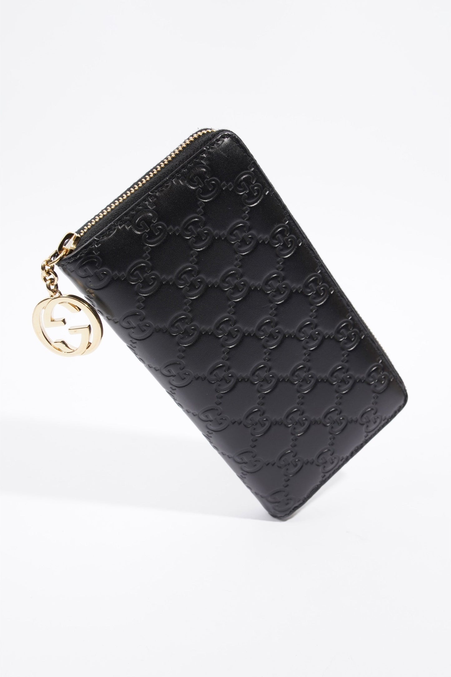 Gucci GG Embossed Zip Around Wallet Black Leather