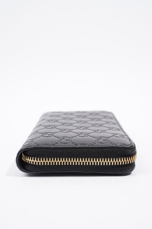 Gucci GG Embossed Zip Around Wallet Black Leather