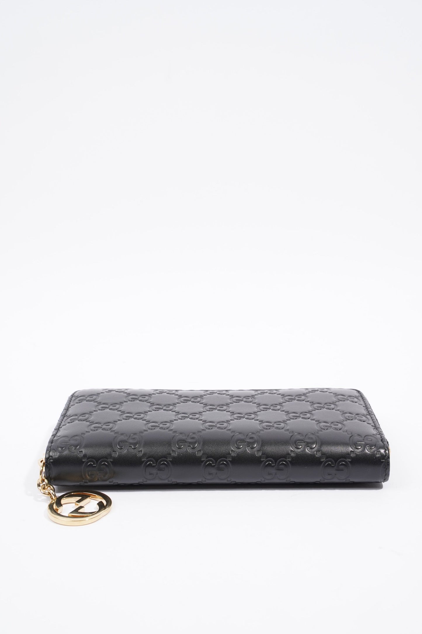 Gucci GG Embossed Zip Around Wallet Black Leather