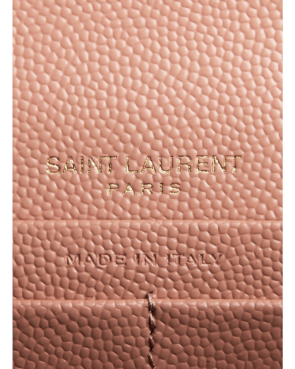 YSL CASSANDRE MATELASSÉ CHAIN WALLET IN GRAIN DE POUDRE EMBOSSED LEATHER