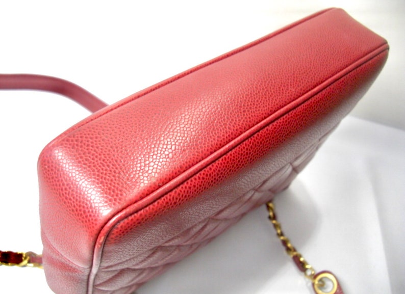 CHANEL Vintage cherry red caviar leather quilted shoulder bag, tote with golden CC ball and chain straps