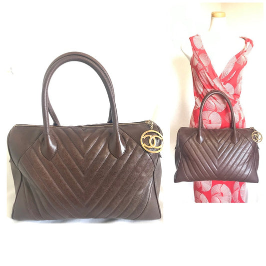 CHANEL Vintage brown caviarskin v stitch, chevron style bag, Speedy bag with golden CC charm