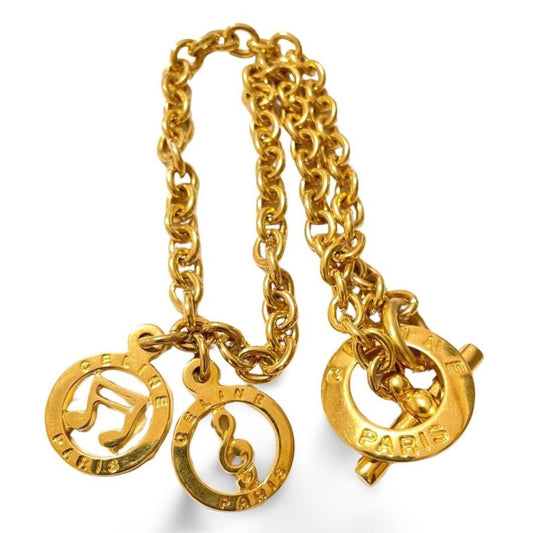 Celine Vintage golden chain necklace with music note charm top