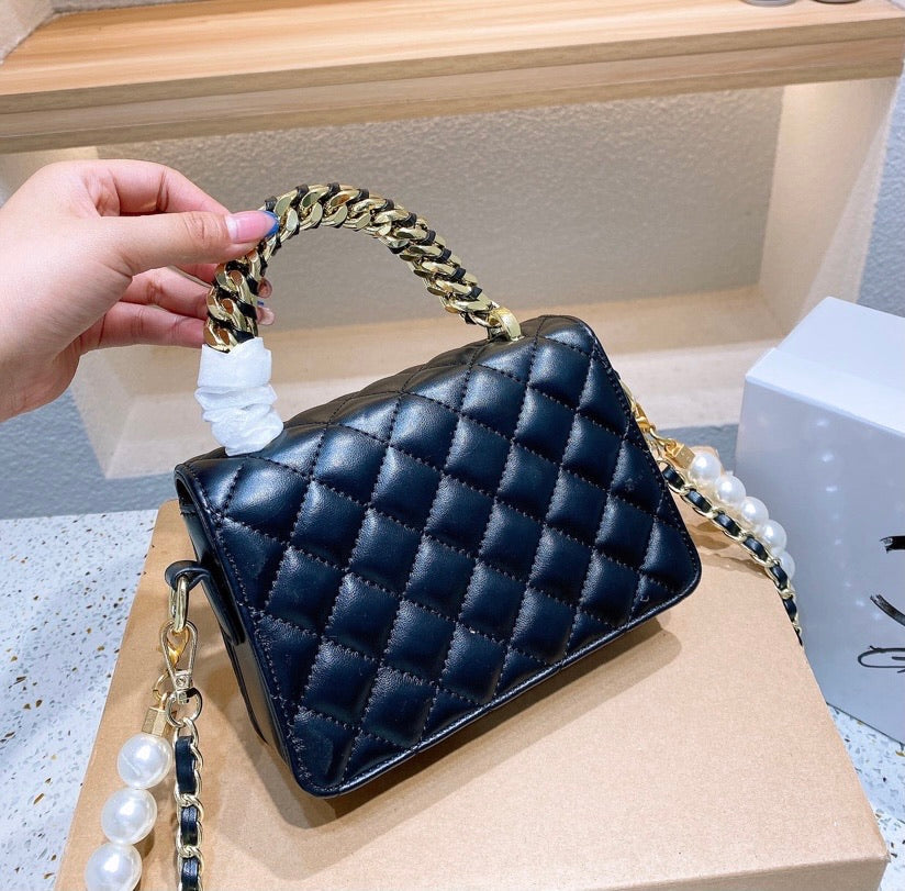 Black leather Chanel handbag