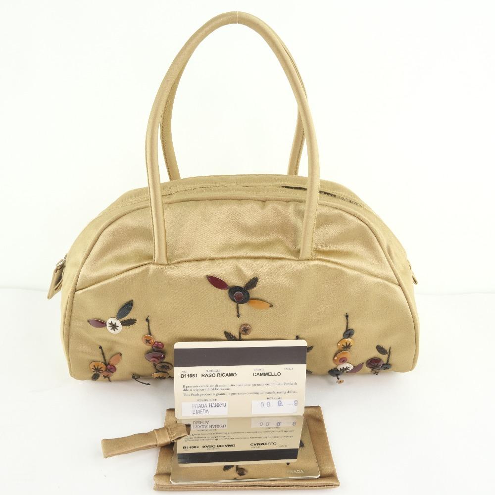 Prada Beige Synthetic  handbag bag