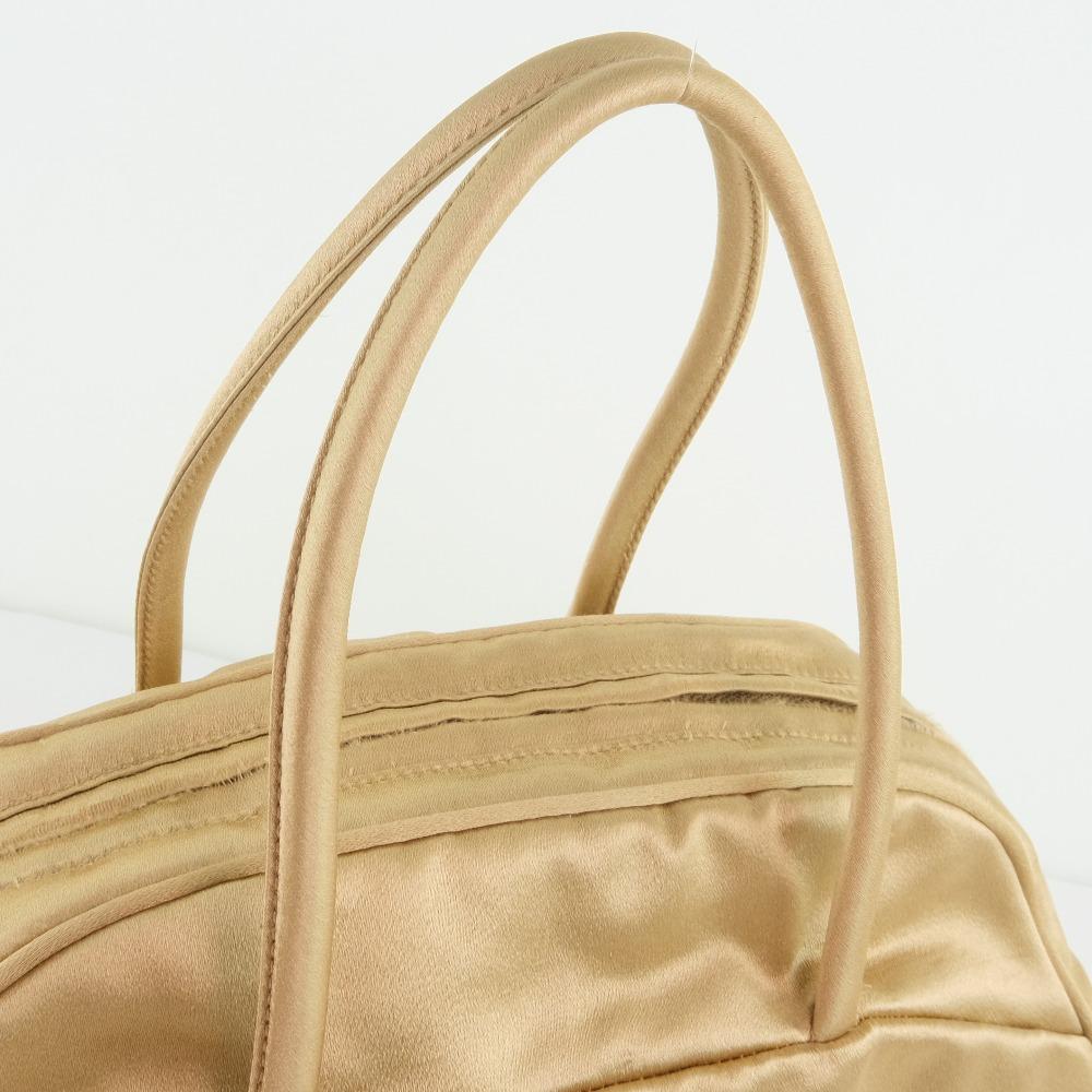 Prada Beige Synthetic  handbag bag